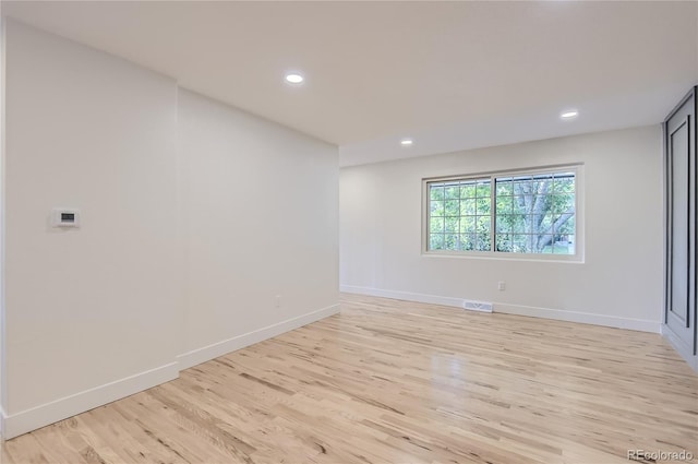 5720 E Caley Ave, Centennial, CO 80111 - empty room featuring light wood finished floors and recessed lighting