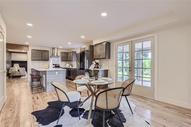 5720 E Caley Ave, Centennial, CO 80111 - dining space with light wood finished floors, recessed lighting, and french doors