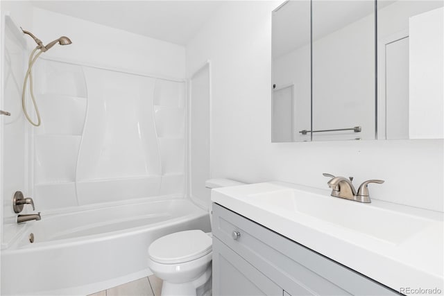 bathroom with shower / bathing tub combination, vanity, and toilet