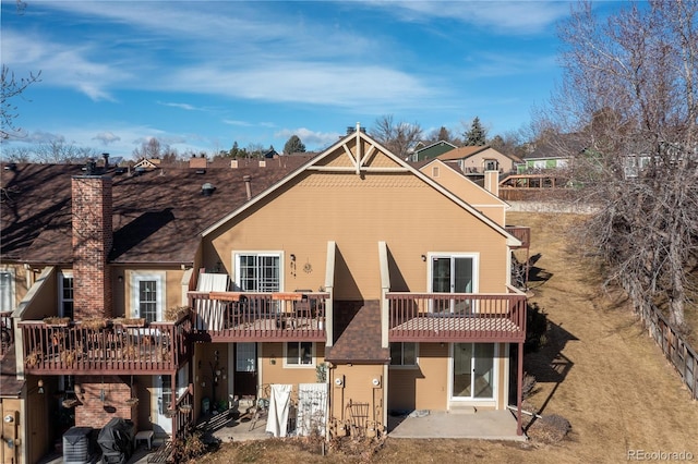 back of house featuring a patio area