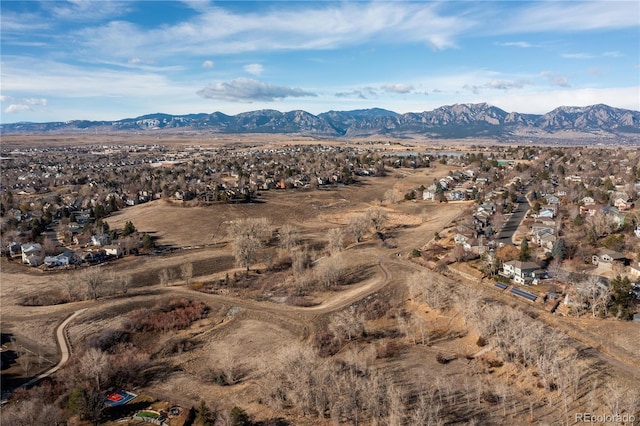 drone / aerial view featuring a mountain view