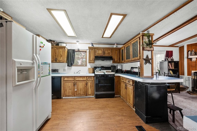 kitchen with a textured ceiling, white refrigerator with ice dispenser, stove, light wood-type flooring, and black dishwasher