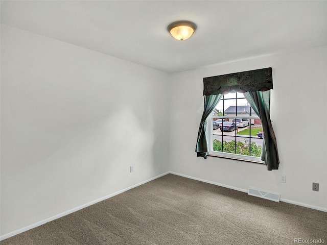 6943 Ingalls St, Arvada, CO 80003 - empty room featuring carpet flooring and baseboards