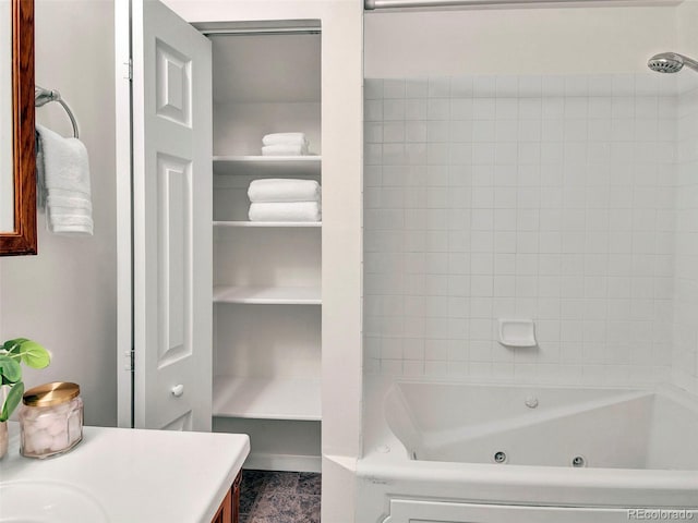 6943 Ingalls St, Arvada, CO 80003 - bathroom with a combined bath / shower with jetted tub and vanity