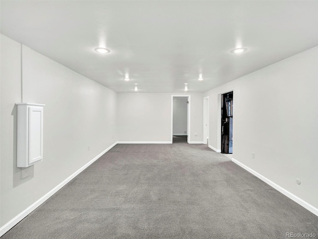 6943 Ingalls St, Arvada, CO 80003 - carpeted spare room with baseboards and recessed lighting