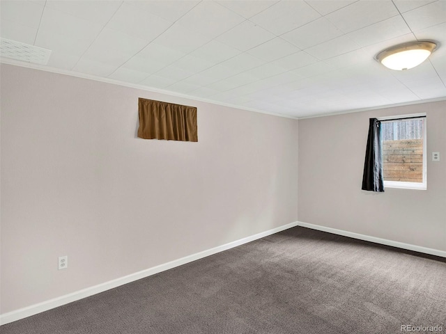 6943 Ingalls St, Arvada, CO 80003 - carpeted spare room featuring crown molding and baseboards