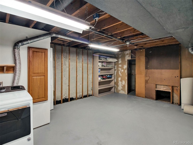 6943 Ingalls St, Arvada, CO 80003 - unfinished below grade area featuring washer / clothes dryer
