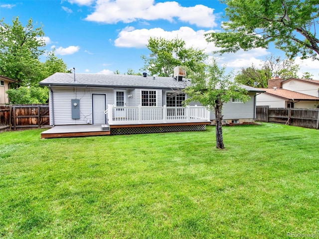 6943 Ingalls St, Arvada, CO 80003 - rear view of house featuring a wooden deck and a shingled roof