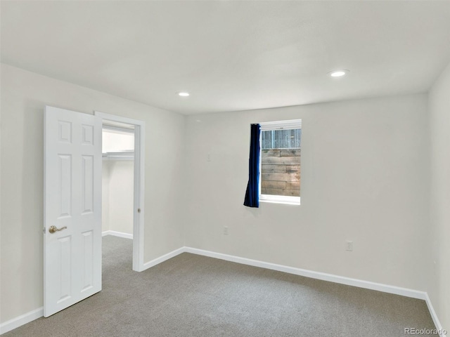 6943 Ingalls St, Arvada, CO 80003 - unfurnished room featuring carpet flooring, baseboards, and recessed lighting