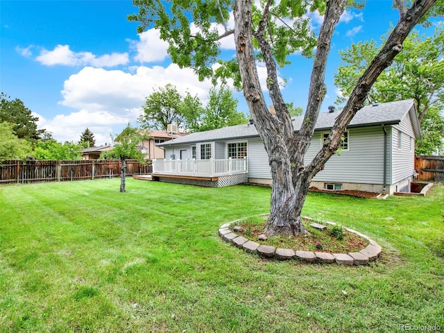 6943 Ingalls St, Arvada, CO 80003 - view of yard featuring a wooden deck