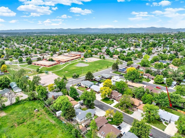6943 Ingalls St, Arvada, CO 80003 - aerial view of residential area with a mountainous background
