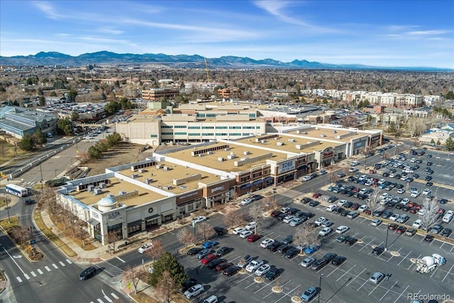 drone / aerial view featuring a mountain view