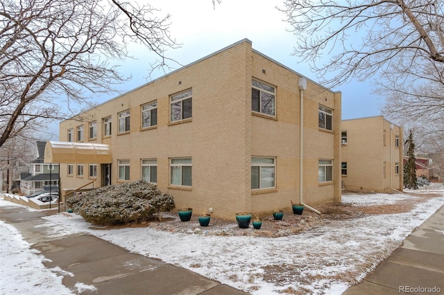 view of snow covered property