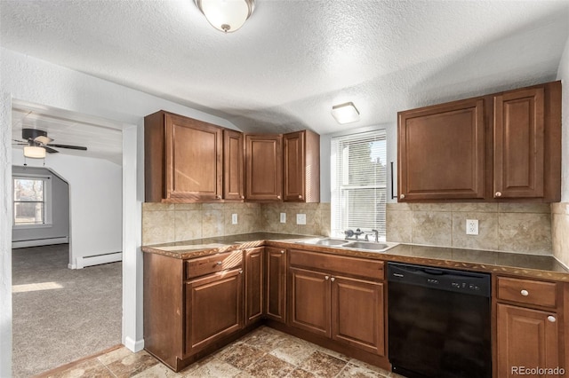 367 S Jasmine St, Denver, CO 80224 - kitchen with black dishwasher, a baseboard heating unit, brown cabinets, a textured ceiling, and lofted ceiling
