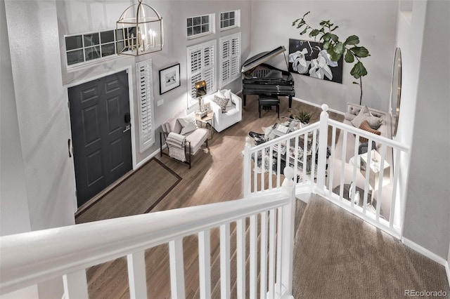 entryway featuring a chandelier and hardwood / wood-style floors