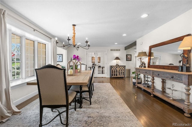 21 Fairway Ln, Littleton, CO 80123 - dining area with wood finished floors, a chandelier, recessed lighting, and baseboards