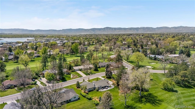 21 Fairway Ln, Littleton, CO 80123 - aerial view of residential area with a golf course and a water and mountain view