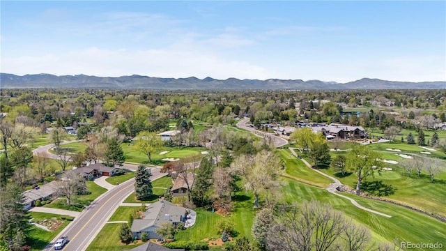 21 Fairway Ln, Littleton, CO 80123 - aerial view of property and surrounding area with a mountain backdrop, a golf course, and nearby suburban area