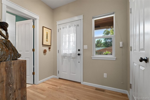 3670 Wolff St, Denver, CO 80212 - entryway featuring light wood-type flooring