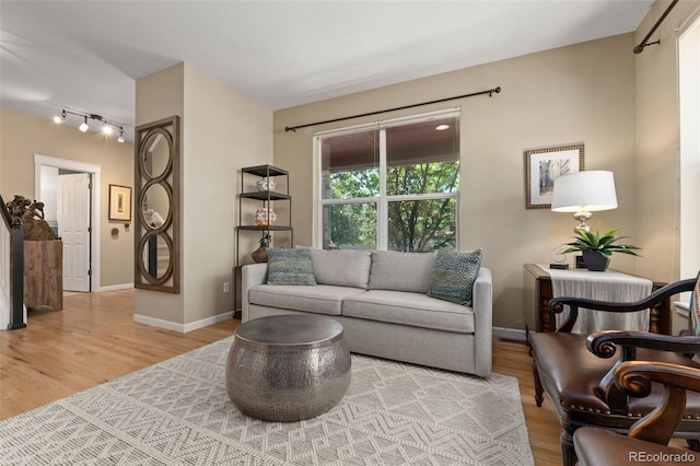 3670 Wolff St, Denver, CO 80212 - living room with light wood-style floors and track lighting