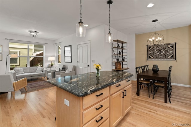 3670 Wolff St, Denver, CO 80212 - kitchen with light wood-style flooring, a chandelier, light brown cabinetry, a center island, and recessed lighting