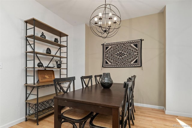3670 Wolff St, Denver, CO 80212 - dining area with a chandelier and wood finished floors