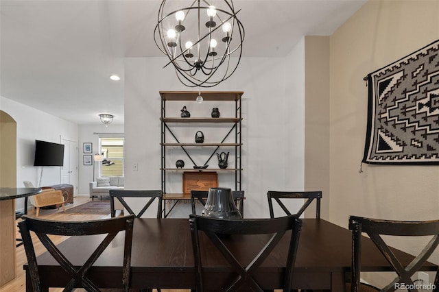 3670 Wolff St, Denver, CO 80212 - dining area featuring a chandelier, recessed lighting, and wood finished floors