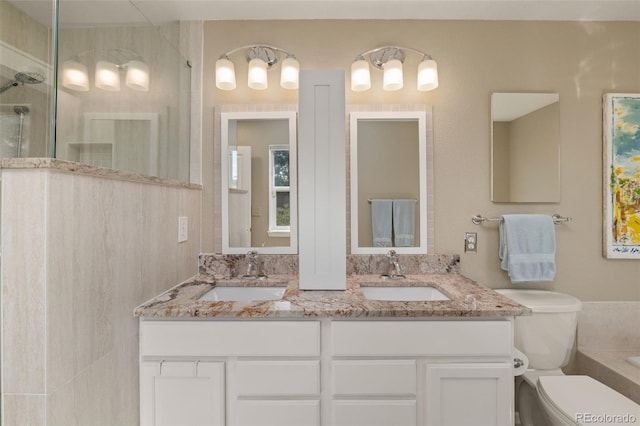 3670 Wolff St, Denver, CO 80212 - bathroom featuring a shower with door and double vanity