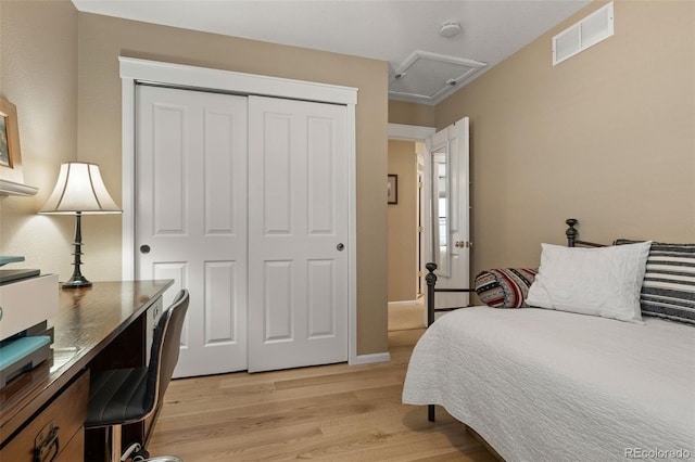 3670 Wolff St, Denver, CO 80212 - bedroom with light wood finished floors, a closet, and a desk