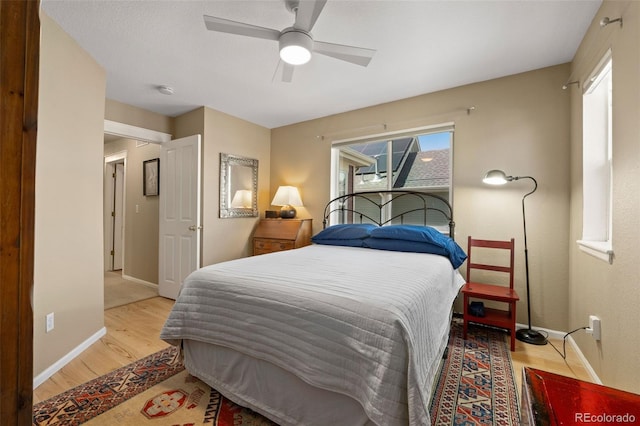 3670 Wolff St, Denver, CO 80212 - bedroom featuring wood finished floors and a ceiling fan