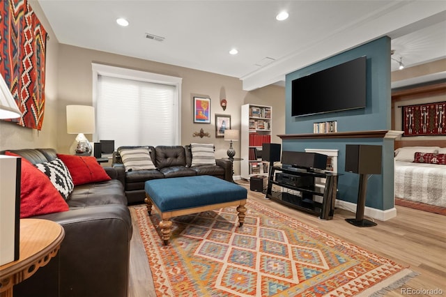 3670 Wolff St, Denver, CO 80212 - living area featuring wood finished floors and recessed lighting