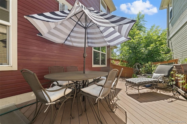 3670 Wolff St, Denver, CO 80212 - wooden deck with outdoor dining area