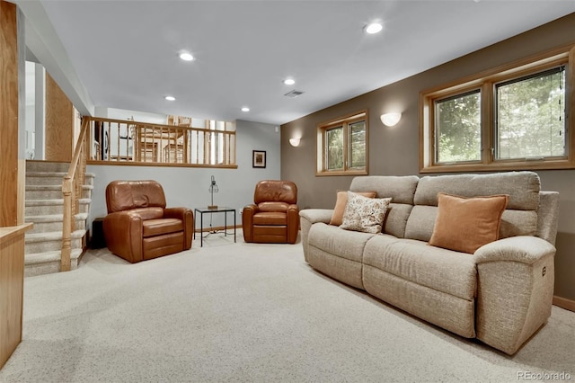 11496 E Wesley Ave, Aurora, CO 80014 - carpeted living room with recessed lighting and stairway