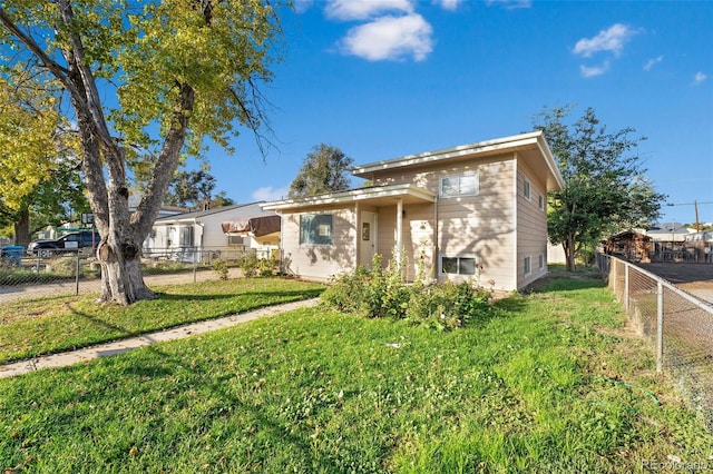 view of front of house with a front yard