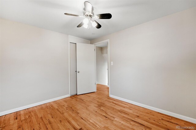 empty room featuring light hardwood / wood-style flooring and ceiling fan