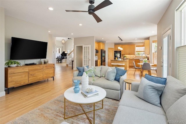 1996 Clipper Dr, Lafayette, CO 80026 - living room with light wood-style floors, recessed lighting, and ceiling fan