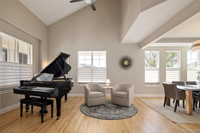 1996 Clipper Dr, Lafayette, CO 80026 - living area with baseboards, ceiling fan, wood finished floors, and high vaulted ceiling