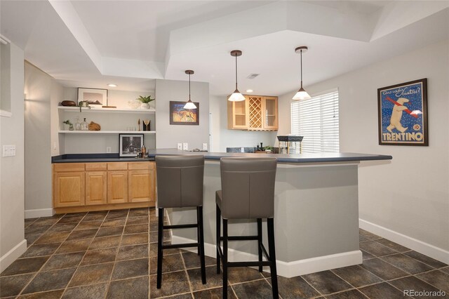 1996 Clipper Dr, Lafayette, CO 80026 - kitchen featuring dark countertops, open shelves, baseboards, a breakfast bar, and recessed lighting