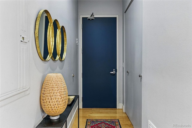 doorway to outside featuring visible vents and light wood-type flooring