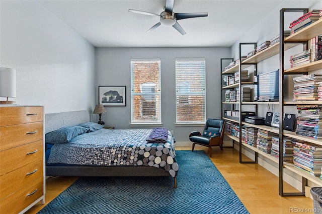 bedroom featuring wood finished floors