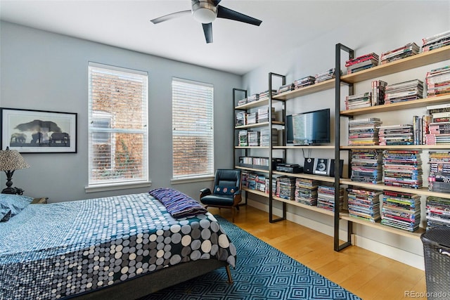 bedroom with wood finished floors