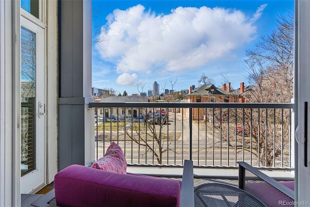 balcony featuring a city view