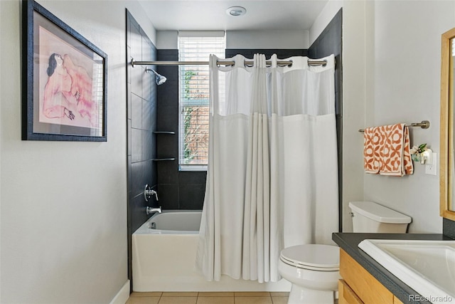 full bath with tile patterned flooring, shower / bath combination with curtain, toilet, and vanity