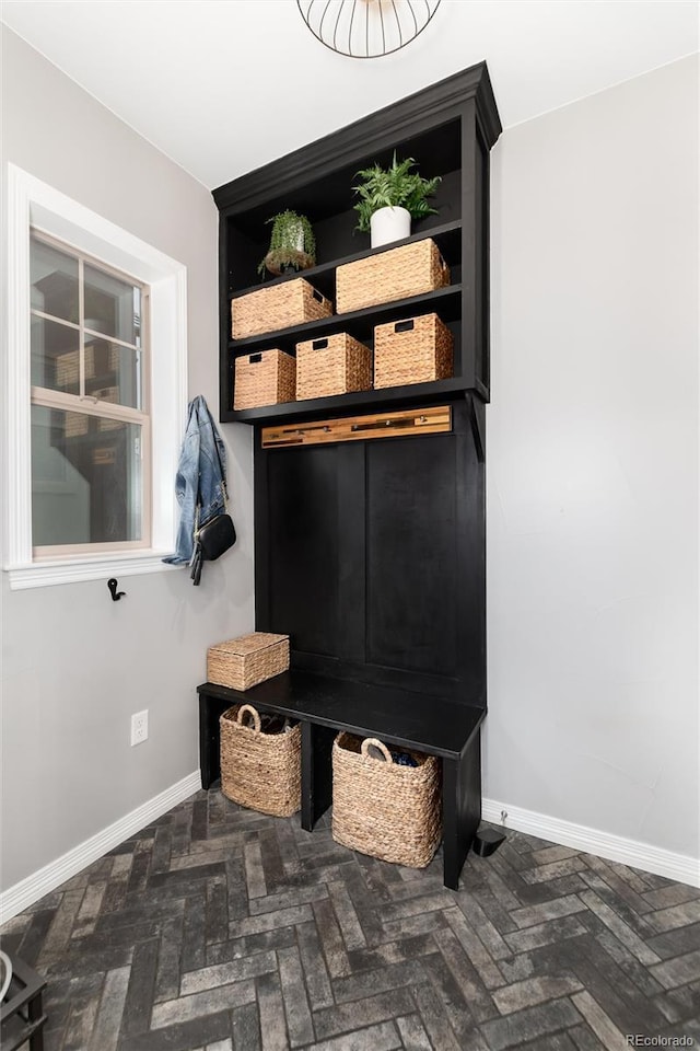 mudroom featuring baseboards