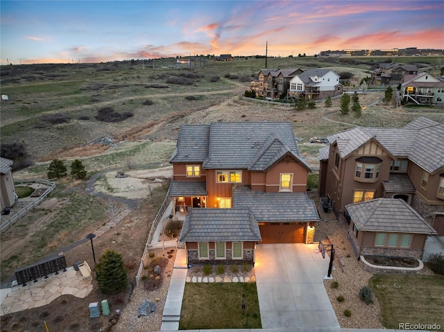 birds eye view of property with a residential view