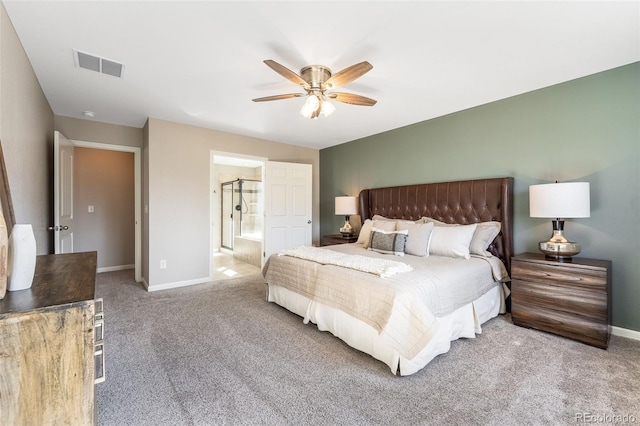 carpeted bedroom with visible vents, baseboards, and a ceiling fan