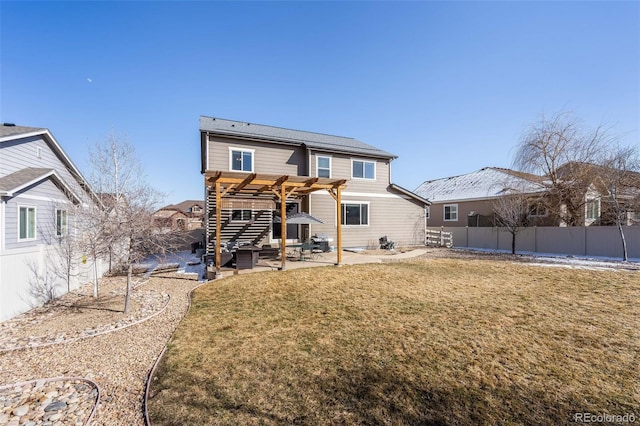 back of property featuring a patio, a lawn, a fenced backyard, and a pergola