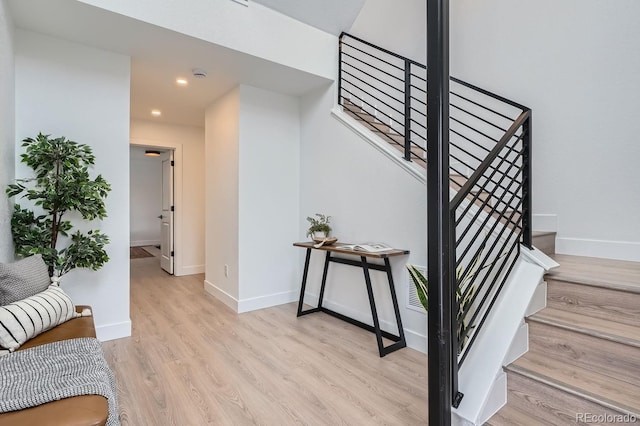 10163 W 38th Ave, Wheat Ridge, CO 80033 - stairs featuring wood finished floors and recessed lighting