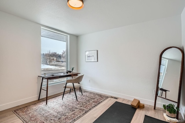 10163 W 38th Ave, Wheat Ridge, CO 80033 - office area with wood finished floors and baseboards