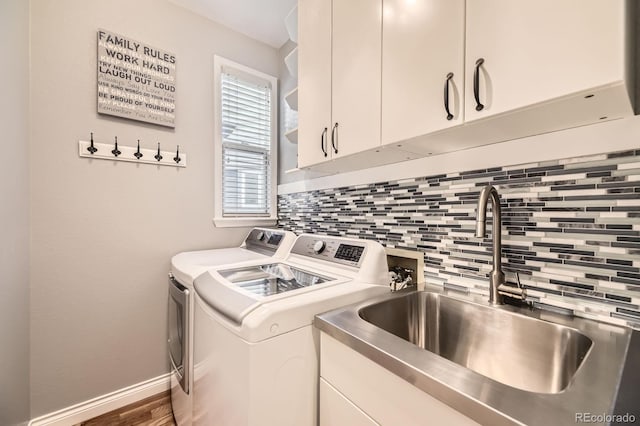 8657 Aberdeen Cir, Highlands Ranch, CO 80130 - laundry area featuring cabinet space and separate washer and dryer